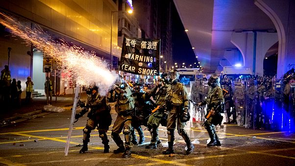 Image: Riot police fire tear gas during demonstrations in Hong Kong Image: Riot police fire tear gas during demonstrations in Hong Kong