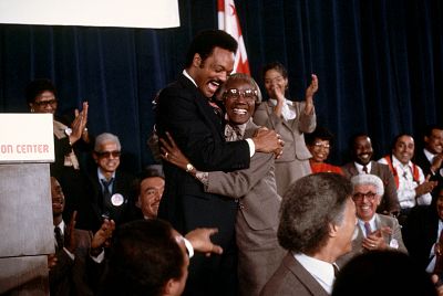 Jesse Jackson hugs former New York congresswoman Shirley Chisholm after announcing his candidacy for president in 1983.