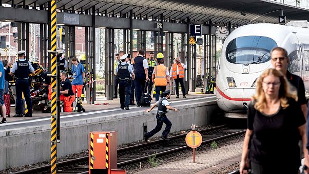 Image: Emergency services stand next to an ICE speed train at aFrankfurt's Image: Emergency services stand next to an ICE speed train at aFrankfurt's