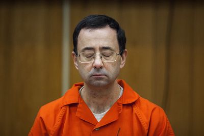 Larry Nassar listens during his sentencing at Eaton County Circuit Court in Charlotte, Michigan,  Monday, Feb. 5, 2018.