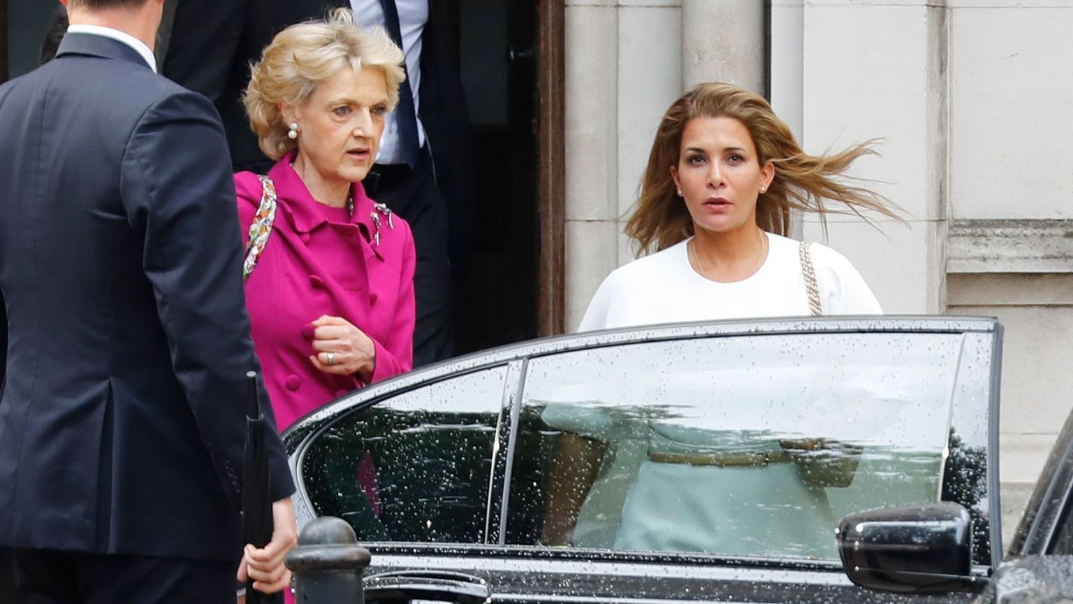 Image: Princess Haya Bint al-Hussein of Jordan, right, accompanied by her l