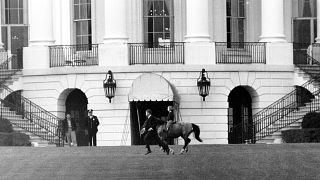 Caroline Kennedy rides her pony, Macaroni, on the south grounds of the Whit
