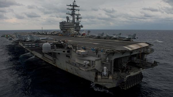 Eight people rescued from US Navy plane crash Eight people rescued from US Navy plane crash