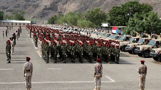 Image: Newly recruited troopers take part in a graduation parade in Aden, Y