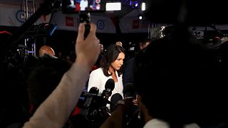 Image: Rep. Tulsi Gabbard, D-HI, speaks to the media after a Democratic pre