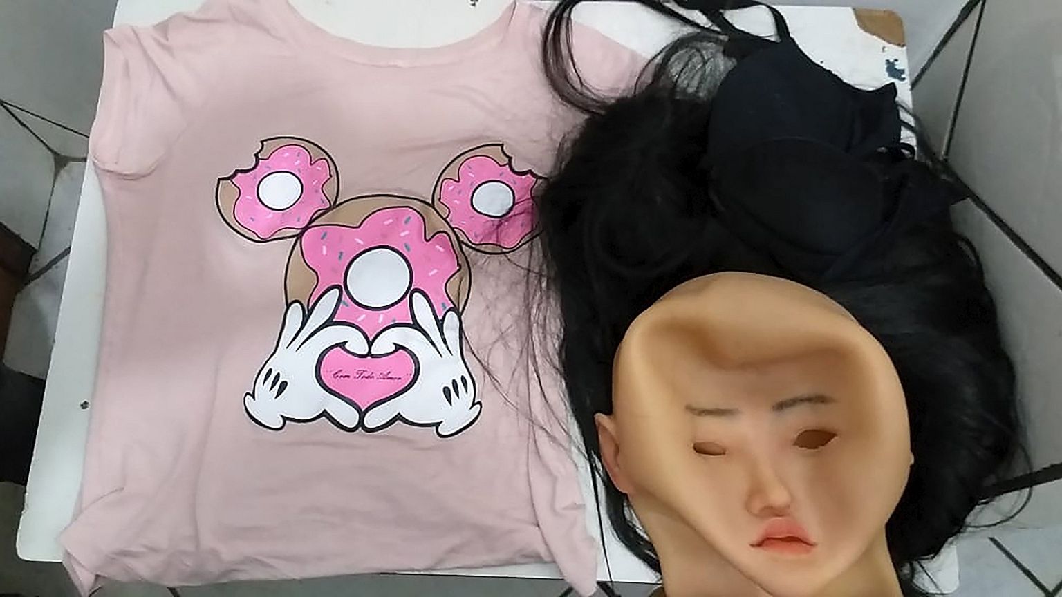 Image: A mask, wig and clothing that was used by jailed Brazilian drug traf