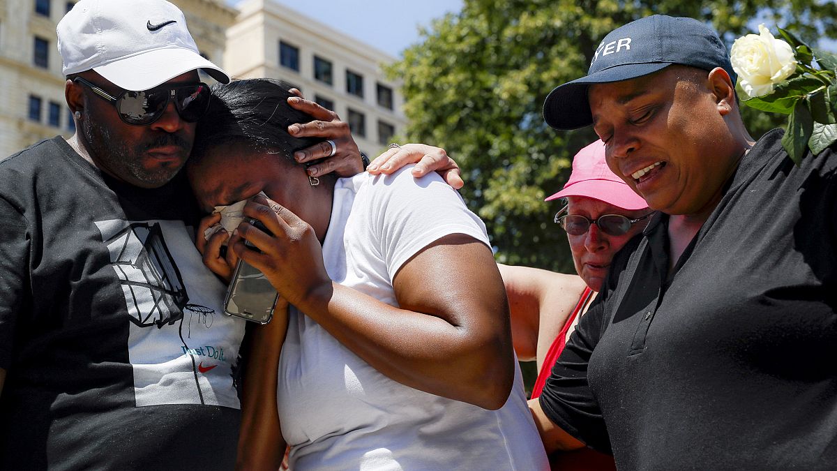 Image: Mourners gather for a vigil after a mass shooting in Dayton, Ohio, o