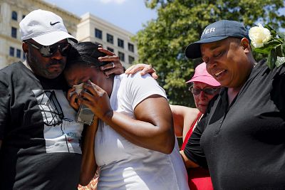 Mourners gather for a vigil after a mass shooting in Dayton, Ohio, on Sunday. 