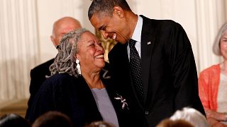 Image: Toni Morrison smiles with President Barack Obama during a Medal of F