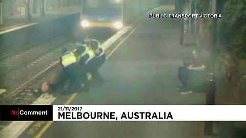 CCTV captures woman's near miss on train tracks