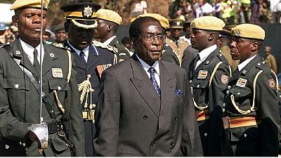 Maybe angels wept, but Mugabe "glowed" with relief after he quit: priest