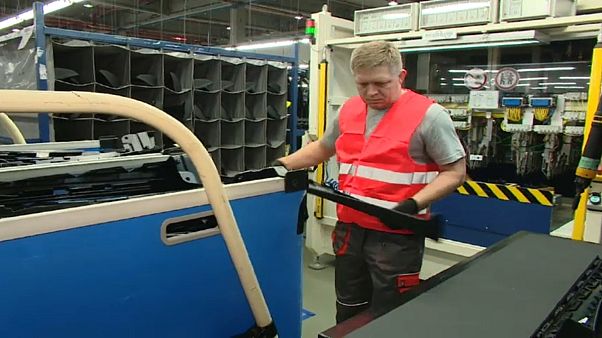 Slovakian PM works night shift in factory, says workers can expect salary bonuses Slovakian PM works night shift in factory, says workers can expect salary bonuses