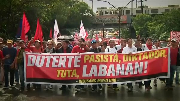 Confrontos entre manifestantes e polícia em Manila Confrontos entre manifestantes e polícia em Manila