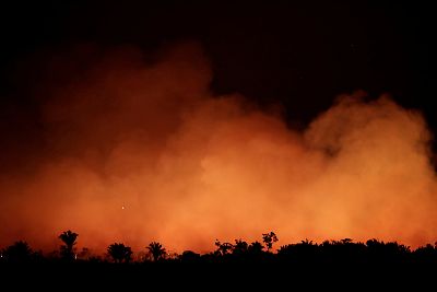 Smoke billows during a fire in an area of the Amazon rainforest near Humaita, Amazonas State, Brazil on Aug. 17, 2019.