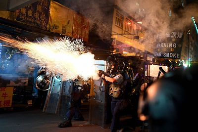 Police fire teargas at protesters on Aug. 14.
