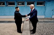 Image: President Donald Trump and North Korean leader Kim Jong Un shake han