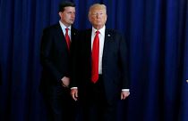 Image: White House Staff Secretary Rob Porter reminds President Donald Trum