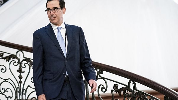 Image: Treasury Secretary Steven Mnuchin walks to a breakfast at the G7 Sum Image: Treasury Secretary Steven Mnuchin walks to a breakfast at the G7 Sum