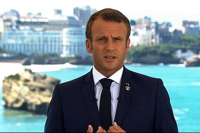 This image grab from footage taken and released by French television channel TF1 shows French President Emmanuel Macron delivering a speech in Biarritz on Saturday.