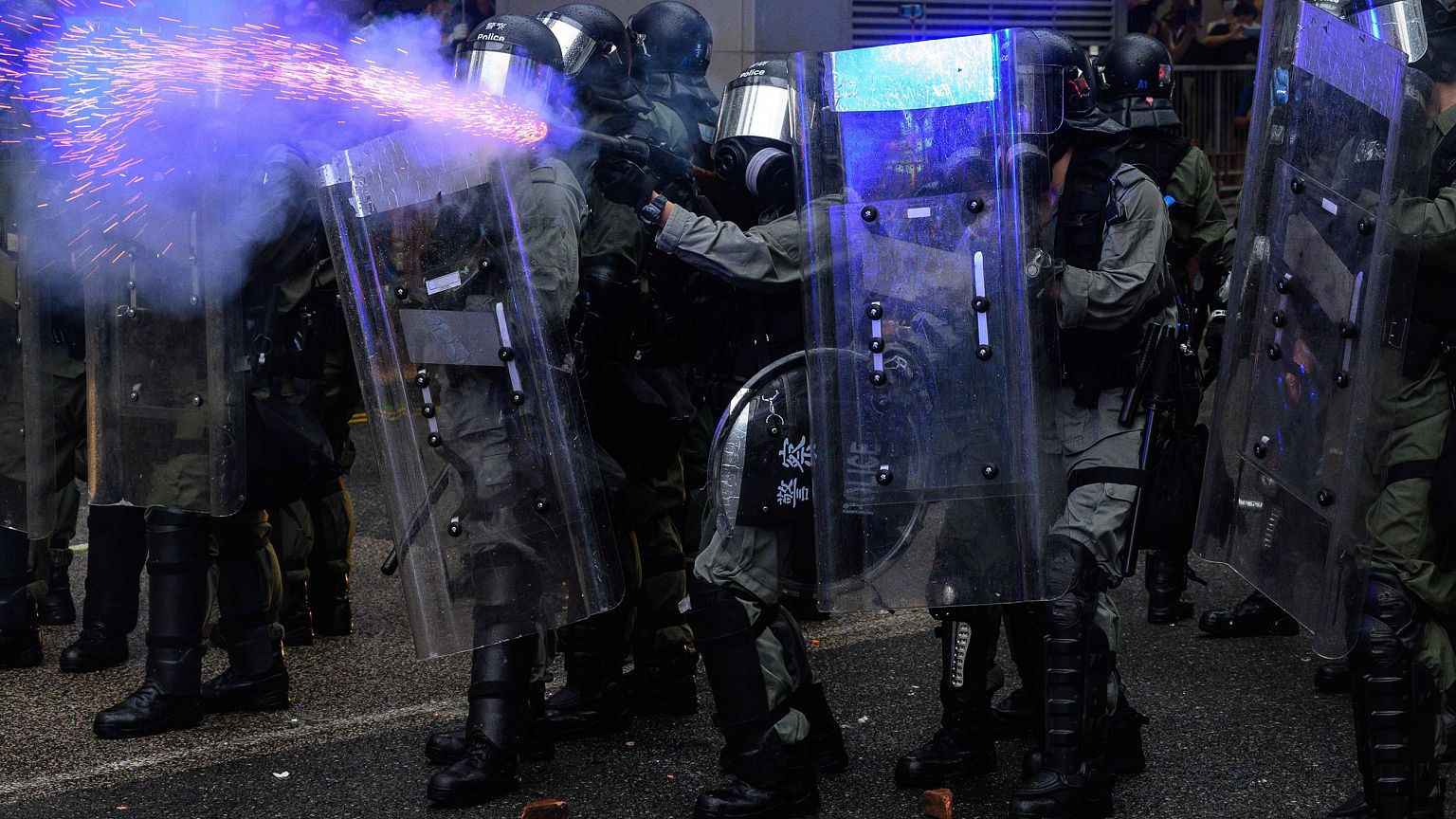 Image: Police fire tear gas during a protest in Tsuen Wan district of Hong 