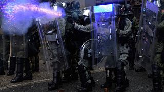 Image: Police fire tear gas during a protest in Tsuen Wan district of Hong