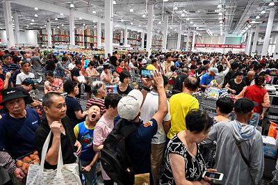 People visit the first Costco outlet in China, on the stores opening day in Shanghai on Aug. 27, 2019.