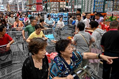People visit the first Costco outlet in China, on the stores opening day in Shanghai on Aug. 27, 2019.