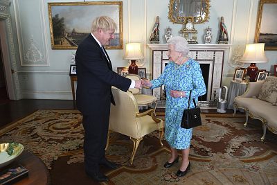 Queen Elizabeth II welcomes newly elected leader of the Conservative Party Boris Johnson at Buckingham Palace on July 24.