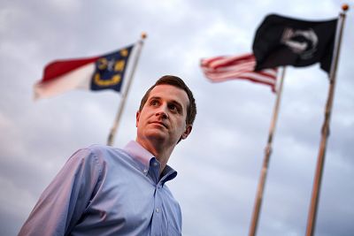 Dan McCready, a Democratic candidate for North Carolina\'s 9th District, talks with voters in Pembroke on Aug. 10, 2019.