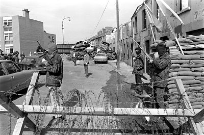 Members of the official IRA seen manning a barricade in the Bogside in Londonderry, Northern Ireland, in April 1972.