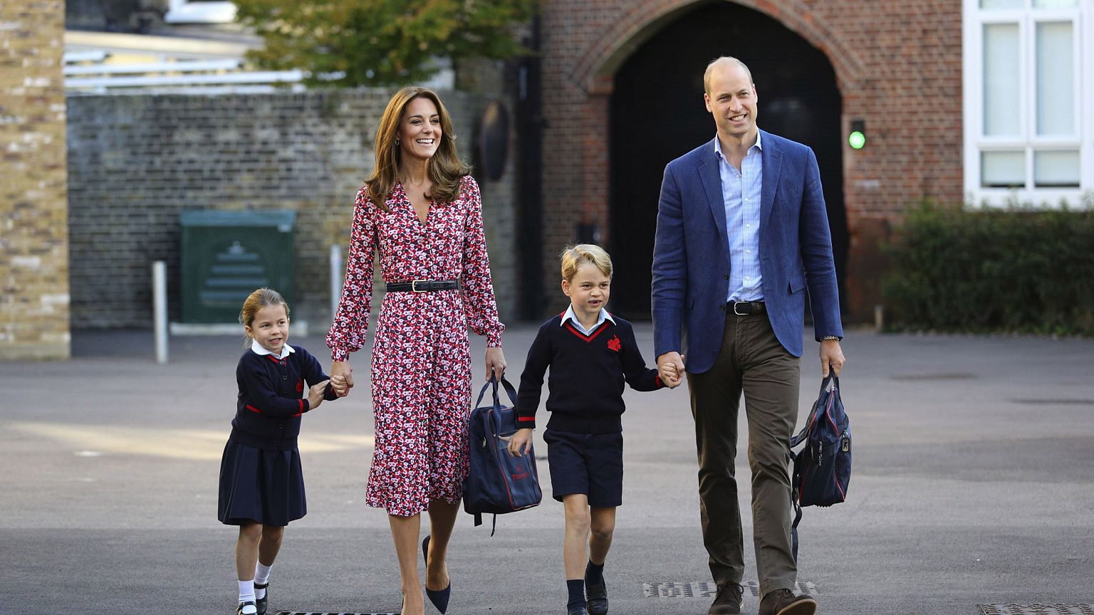 Image: Britain's Princess Charlotte, left, with her brother Prince George a