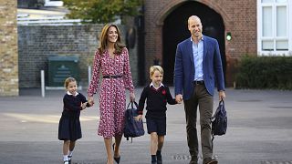 Image: Britain's Princess Charlotte, left, with her brother Prince George a