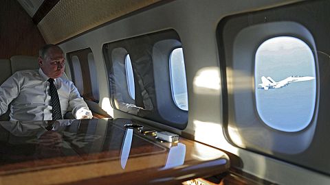 Putin visits Russian military base in Syria