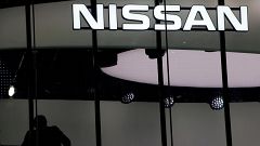 Image: FILE PHOTO: Man is silhouetted at a show room of Nissan Motor Co. in
