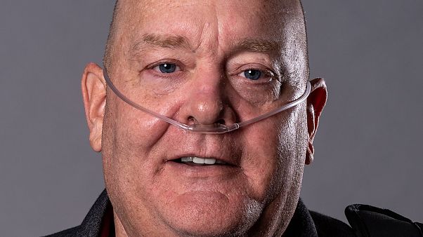 Shows Tom Frey, a retired NYPD detective who became sick after helping in t Shows Tom Frey, a retired NYPD detective who became sick after helping in t
