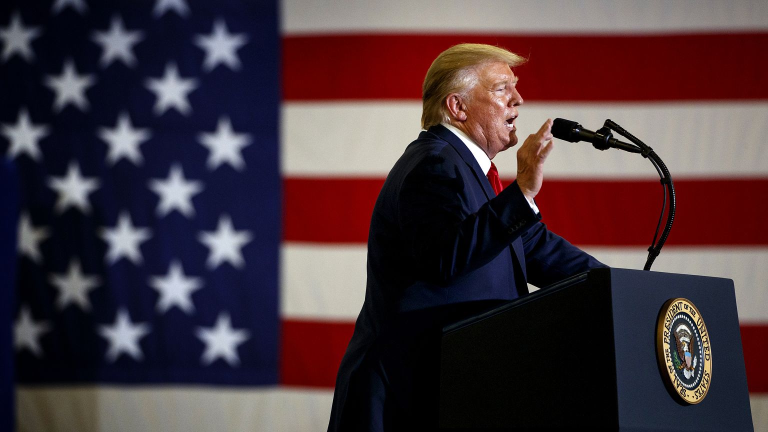 Image: President Donald Trump speaks at a campaign rally in Fayetteville, N