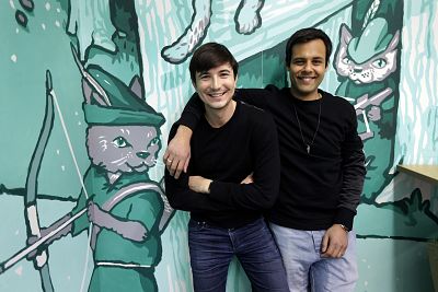 Robinhood co-founders Vlad Tenev, left, and Baiju Bhatt pose at company headquarters in Palo Alto, Calif., on Dec. 2, 2015.