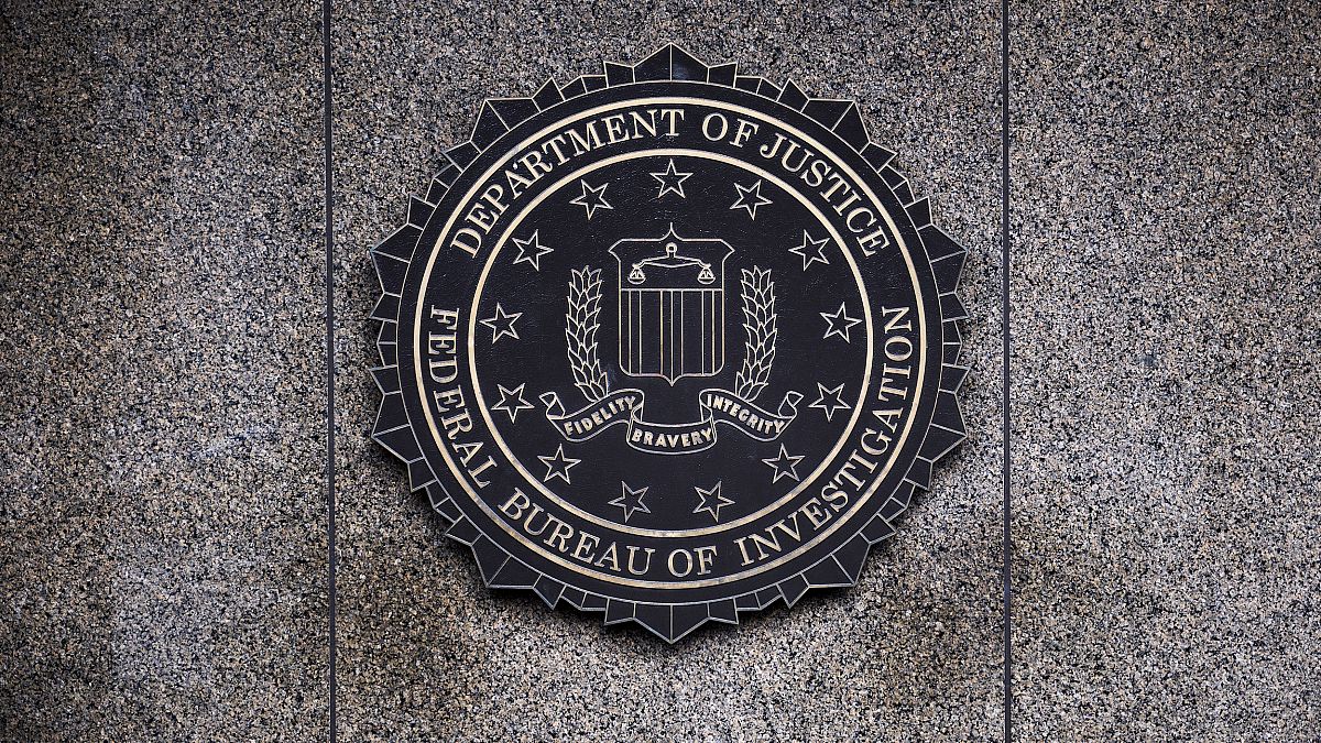 Image: The Federal Bureau of Investigation seal is displayed outside FBI he