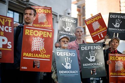 Demonstrators protest outside the Supreme court in central London on the first day of the hearing into the decision by the government to prorogue parliament. 