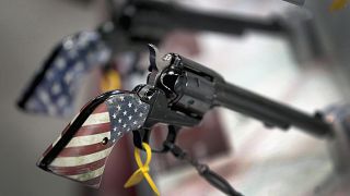 Image: Pistols are displayed in the Heritage Manufacturing booth at the 148