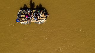 Image: Migrants cross the Suchiate River from Tecun Uman, Guatemala, to Ciu
