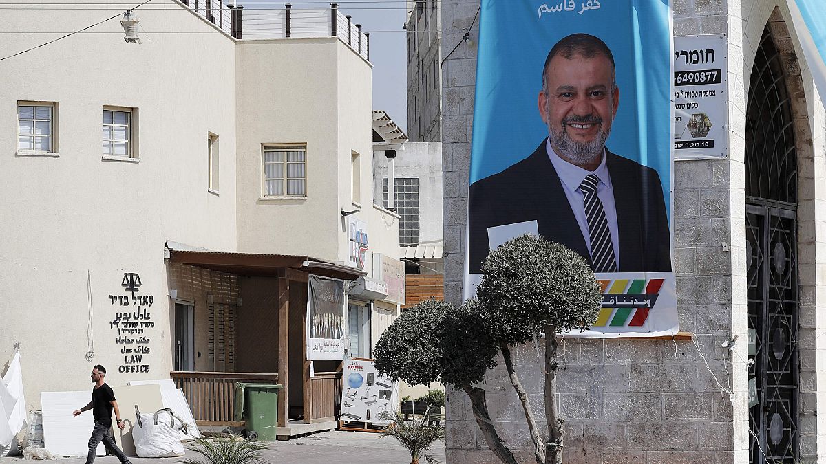 Image: CORRECTION-ISRAEL-ARAB-VOTE