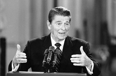 President Ronald Reagan gestures as he participates in a White House East Room news conference on Feb. 21, 1985 in Washington.