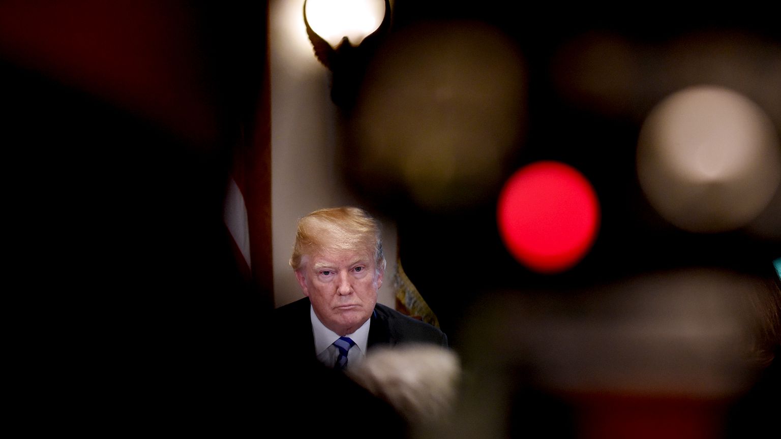 Image: President Donald Trump listens during a meeting in the Cabinet Room 