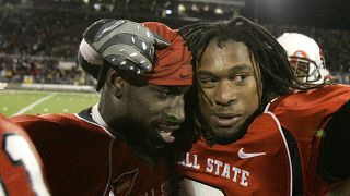 Image: Ball State linebacker Wendell Brown, left, stands with cornerback Tr