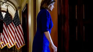 Image: House Speaker Nancy Pelosi walks from the podium after announcing a 