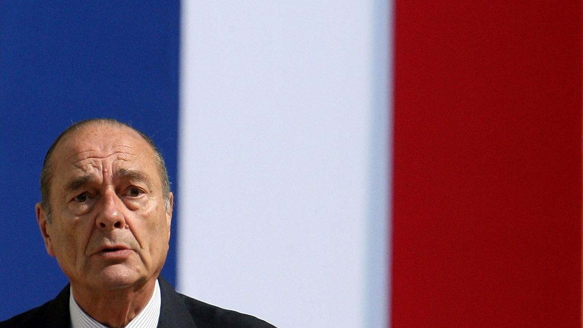 Image: France's President Jacques Chirac delivers a speech as he presides o