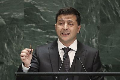 President of Ukraine Volodymyr Zelensky holds up a bullet as he addresses the United Nations General Assembly on Wednesday in New York City.