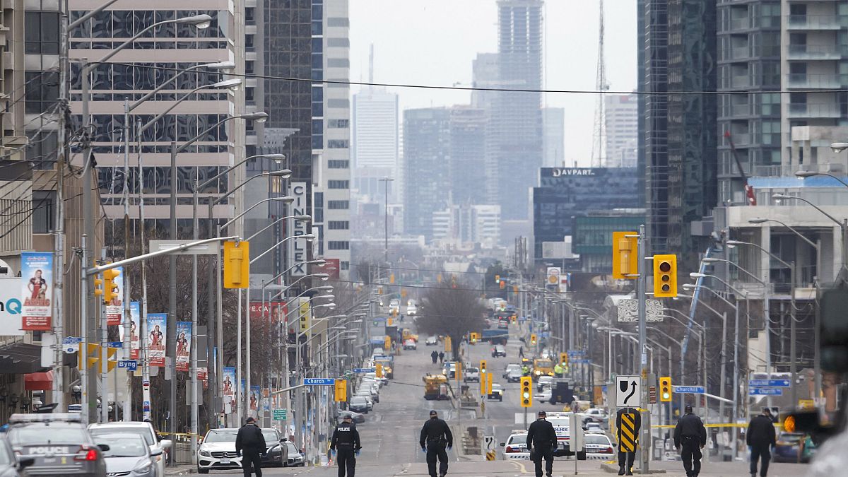 Image: Police officers sweep Yonge St. on April 24, 2018 in Toronto, Canada