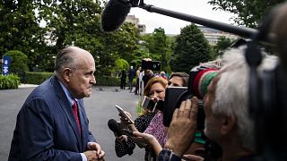 Rudy Giuliani speaks with reporters during on the South Lawn of the White H
